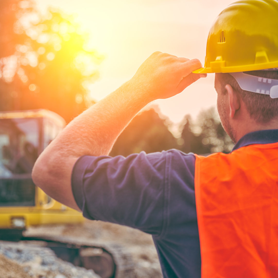 Working in construction under the hot sun.