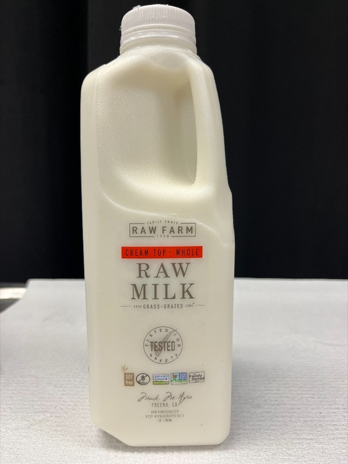 Photo of front of Raw Farm raw milk carton