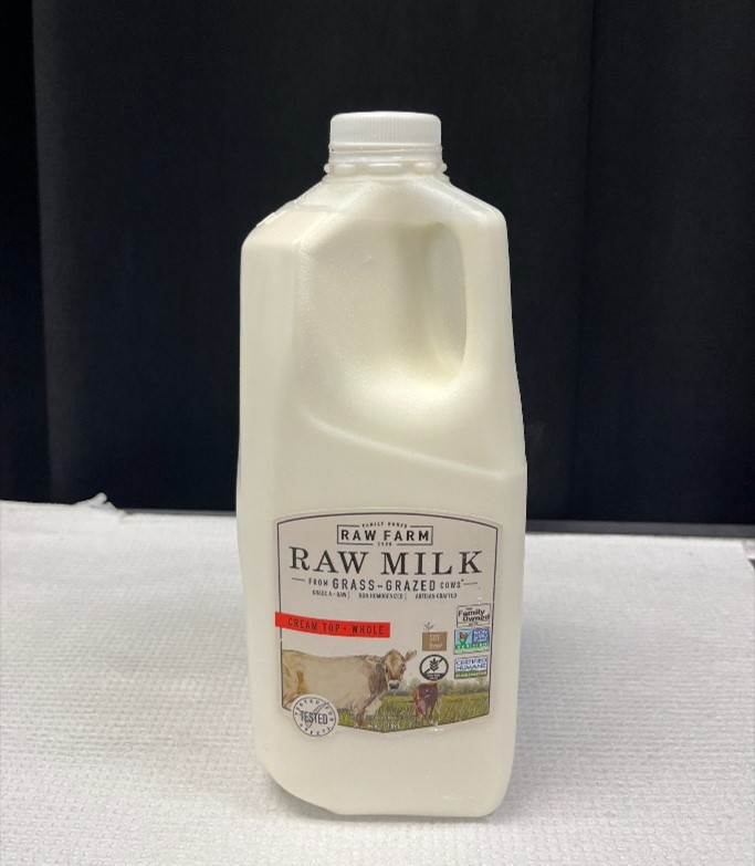 Front side of Raw Farm LLC raw milk carton