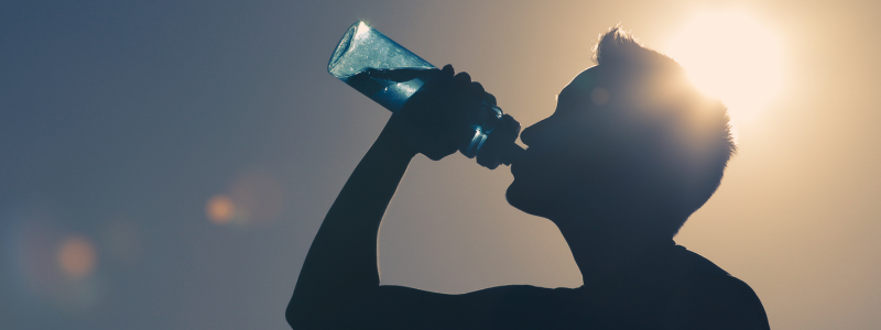 Man drinking water after workout.