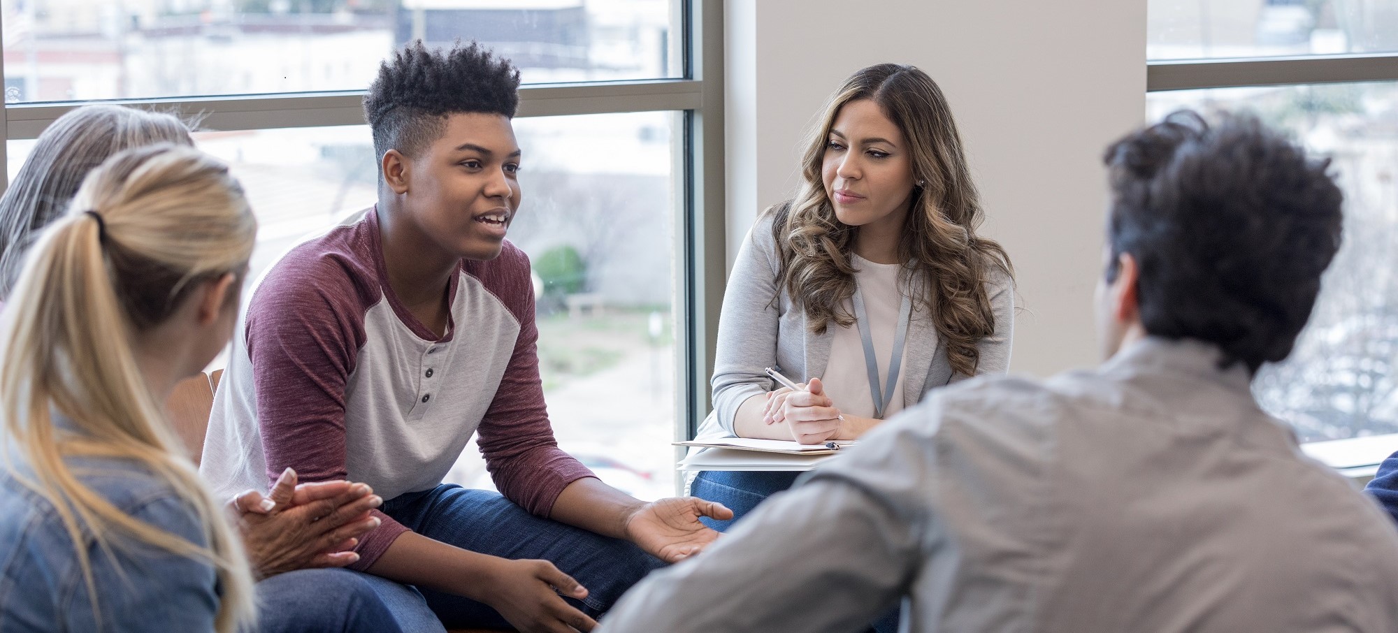 Group of young people in discussion